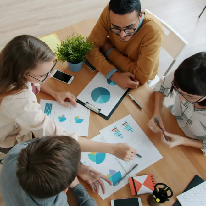 Image of people sitting around a table