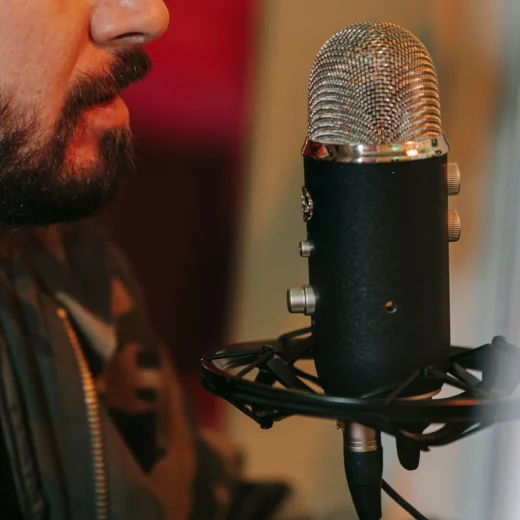 man speaking to a mic
